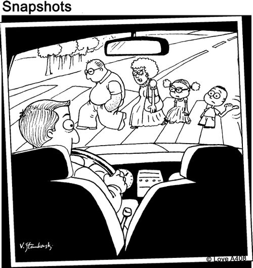 Family crossing - boy thumbing a ride.