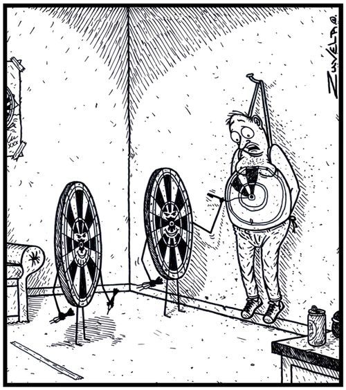 A Man about to become a Human Darts board