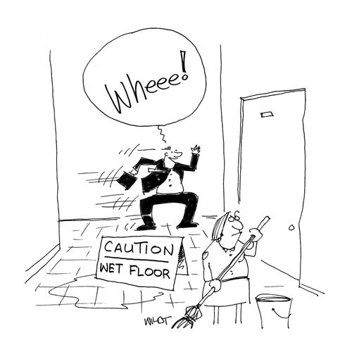 Executive ignores wet floor warning and slides down hall