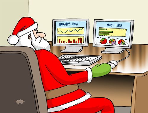 Santa sits in front of computers with naughty data and nice data screens.