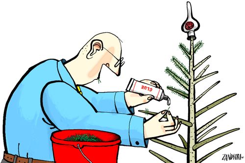 Man glueing individual needles to Christmas tree.