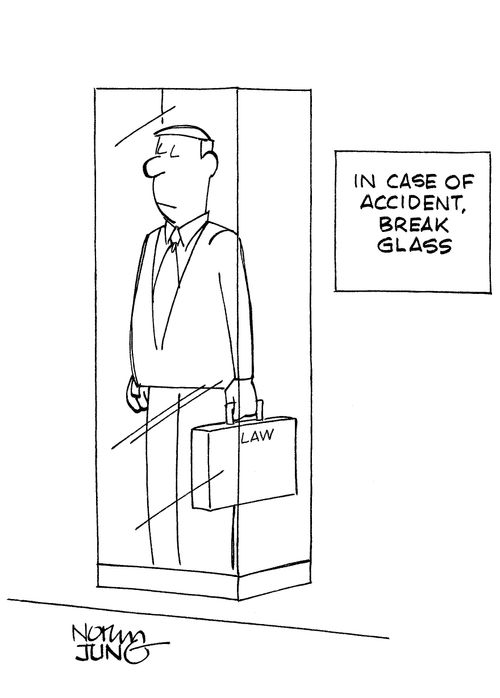 Lawyer encased in glass with sign: In case of accident, break glass.