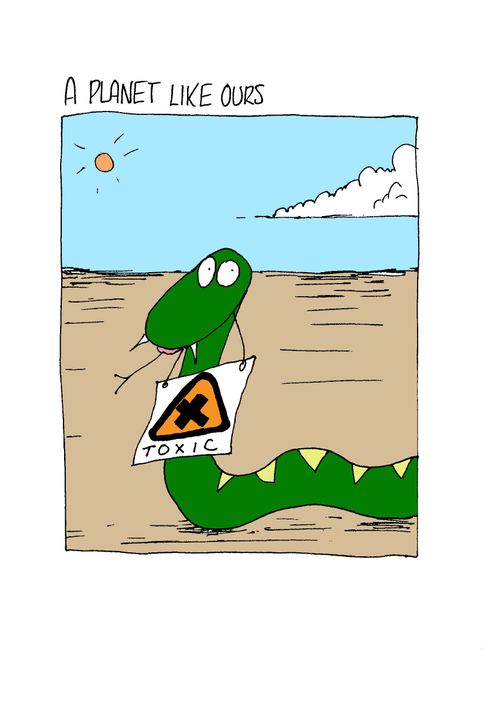 Snake with 'toxic' sign around it's neck.