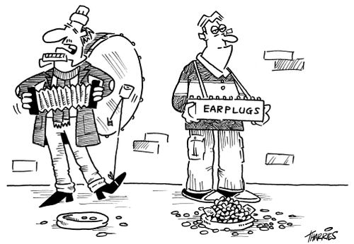 Earplug salesman next to busker.