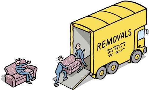 Men load a sofa into truck while their colleague takes it easy.