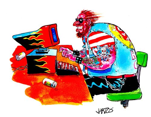 Biker working at computer with flame motif.