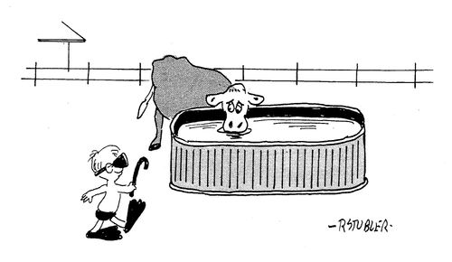 Farm boy about to go swimming in cattle water tank.