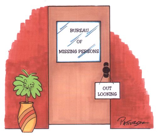 Sign Stating 'Out Looking' at Bureau for Missing Persons