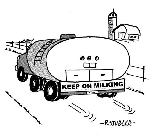 Milk truck with 'Keep on Milking' bumper sticker.