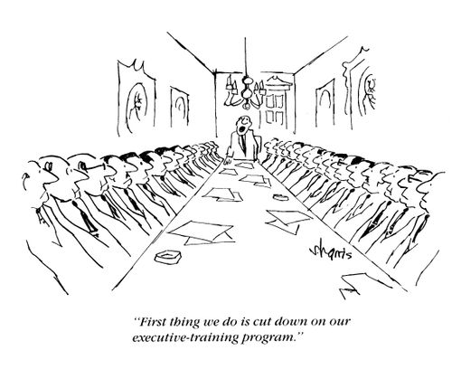 Executive board meeting discussing new training strategy.