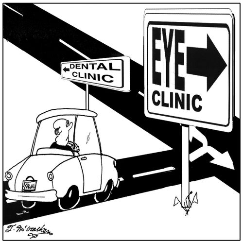A road sign to 'Eye Clinic' is humongous compared to the 'Dental Clinic' sign.