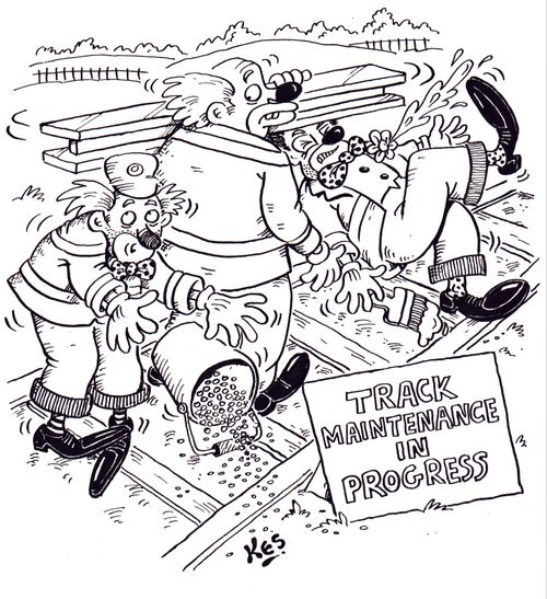 Clowns carry out railway line maintenance.