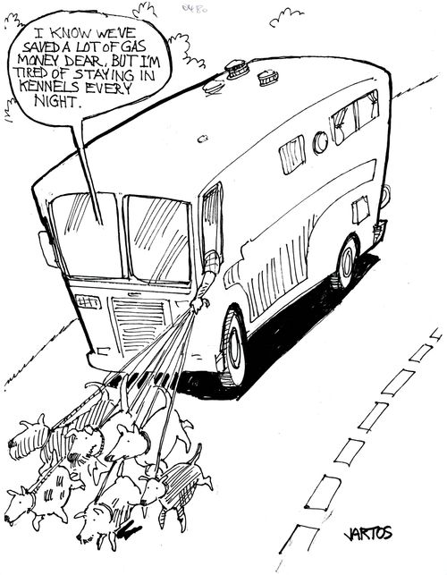 Couple using dogs to pull their camper van.