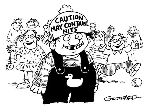 Boy wearing hat saying: 'Caution - may contain nits.'