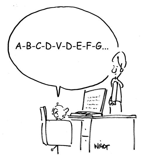 Kid learning alphabet on computer say ABCDVD...