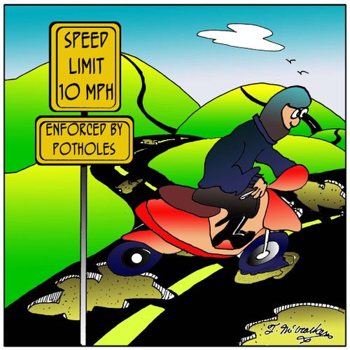 Speed Limit 10 MPH. Enforced by Potholes.