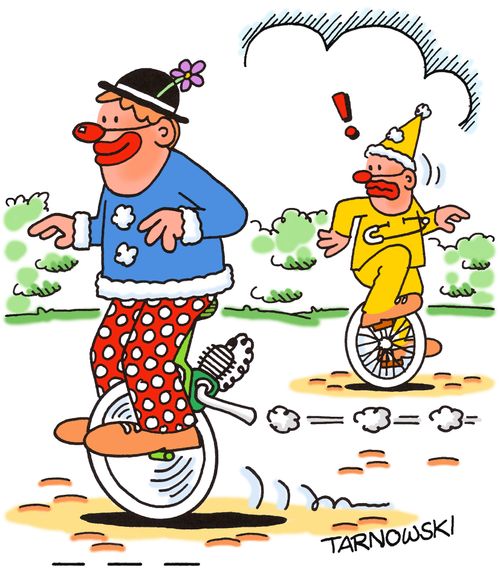 Clown on a motorised unicycle.