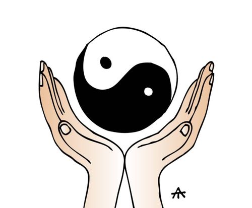 A pair of hands holds a yin and yang symbol.