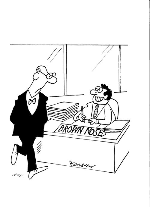 Desk sign: 'Brown-nose'.
