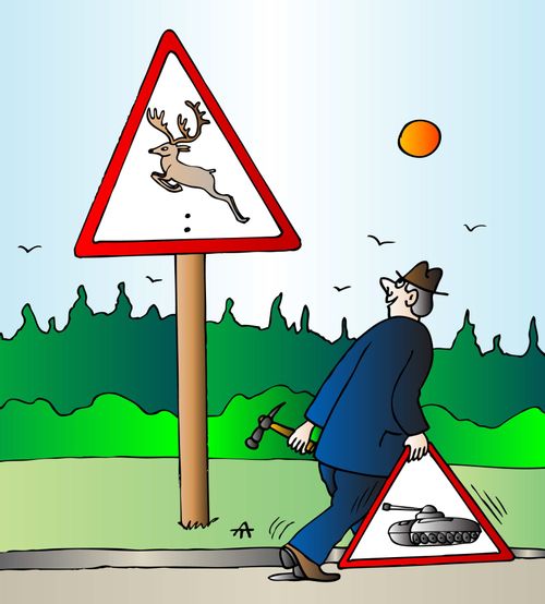 Man replaces tank sign with deer sign
