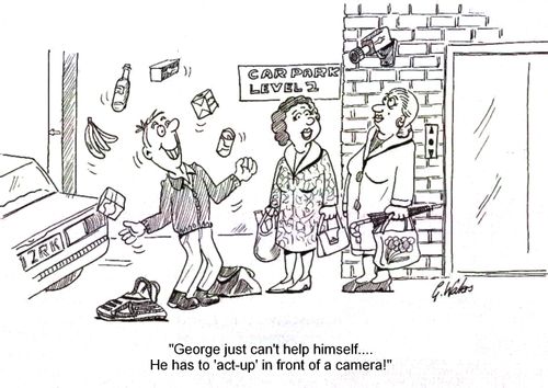 'George just can't help himself....He has to 'act-up' in front of a camera!'