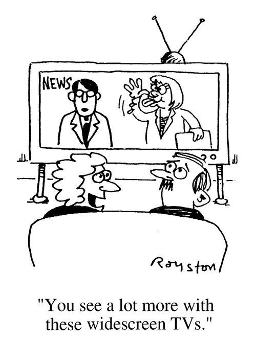 Couple watching television, "You see a lot more with these widescreen TV's"