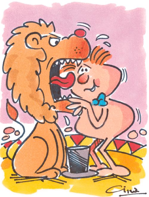 Man putting his head in a lion's mouth