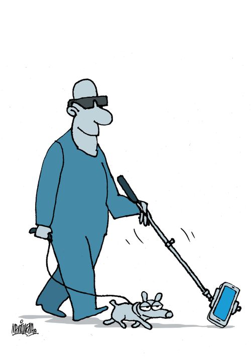 Blind man using a selfie stick. 