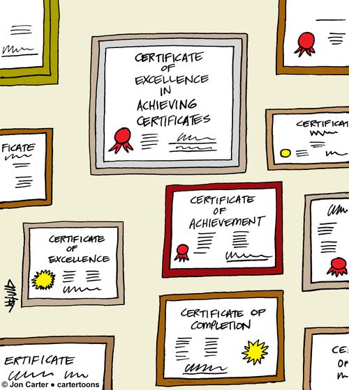 Many certificates of achievement on the wall.