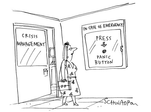 Lady leaving a crisis management office past an emergency panic button.