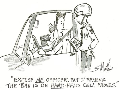 'Excuse me, Officer. But I believe the ban is on hand-held cell phones.'