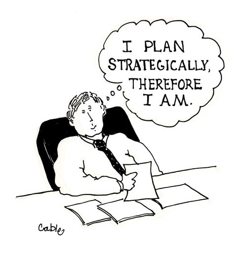 Executive at desk, thinking: 'I plan strategically, therefore I am.'