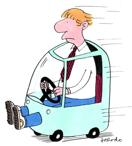 Man driving very small car
