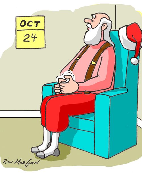 Santa twiddles his thumbs as he waits for Christmas.