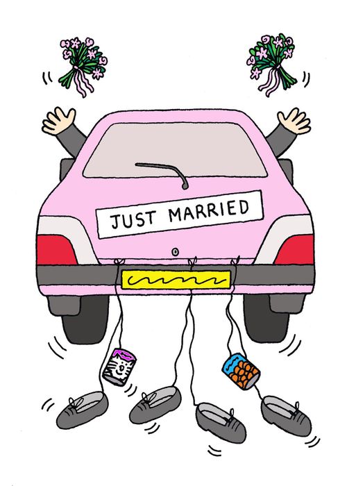 Back view of pink car with 'Just married' on the back.