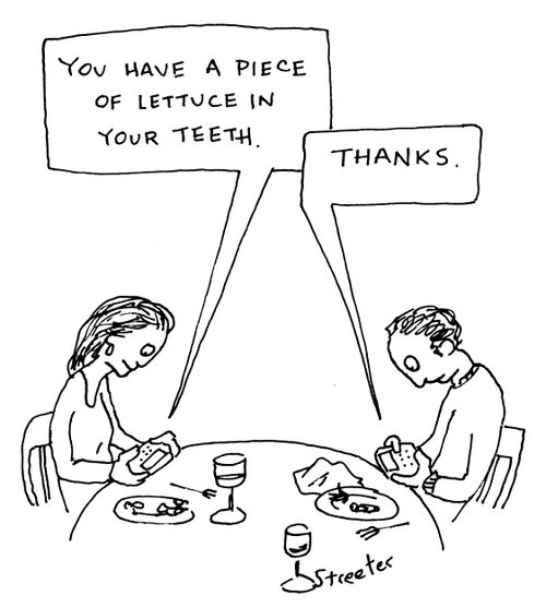 Text message: You have lettuce in your teeth.