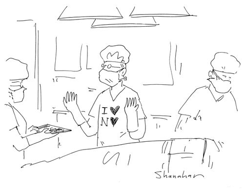 Surgeon with hearts on his shirt.