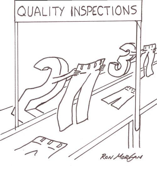 Inspectors #2 and #3 inspect clothing.