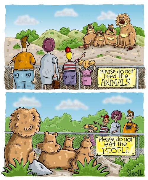 Sign in Lion Enclosure: 'Please Don't Eat the People.' 