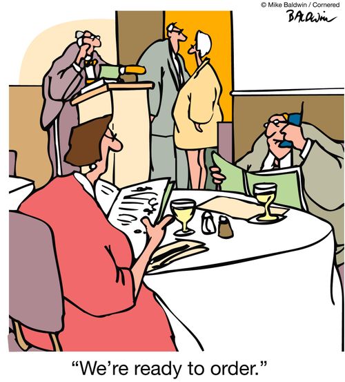 Man telephoning head waiter 'We're ready to order.'
