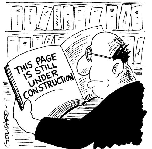 Man looking at book in a library 'This page is still under construction'
