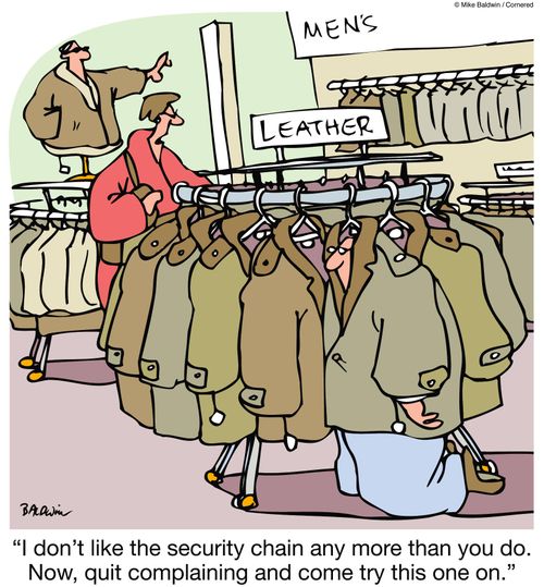 "I don't like the security chain any more than you do. Now, quit complaining and come try this one on."