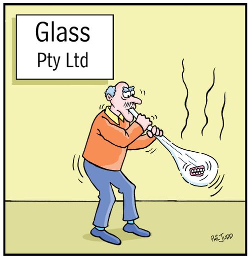 Man blowing glass. His dentures have fallen out and are in the glass bubble.