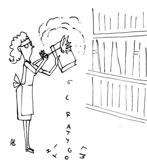 Cleaner dusts the letters of a book.