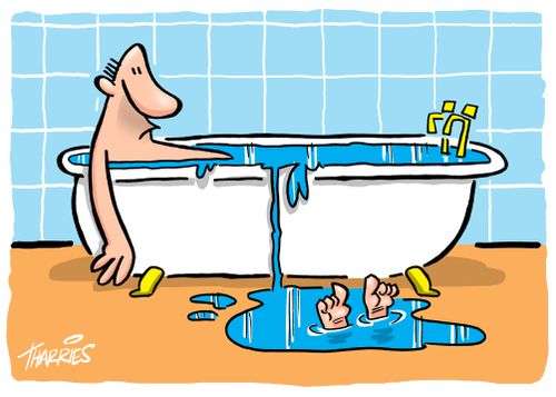Toes stick out of overflowing bath.