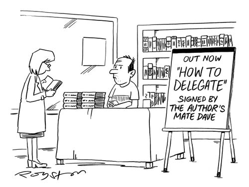 Sign reads: 'Out now: HOW TO DELEGATE. Signed by the author's mate Dave.'