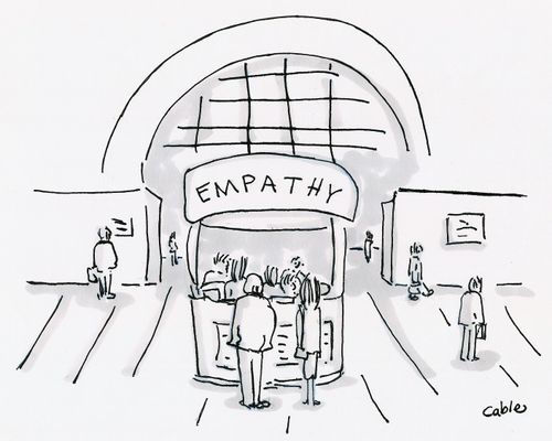 Kiosk in large lobby with sign above it labeled 'Empathy'.