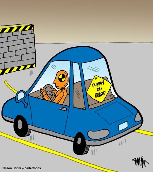 Crash test dummy has sign in rear of test car that says "Dummy On Board"