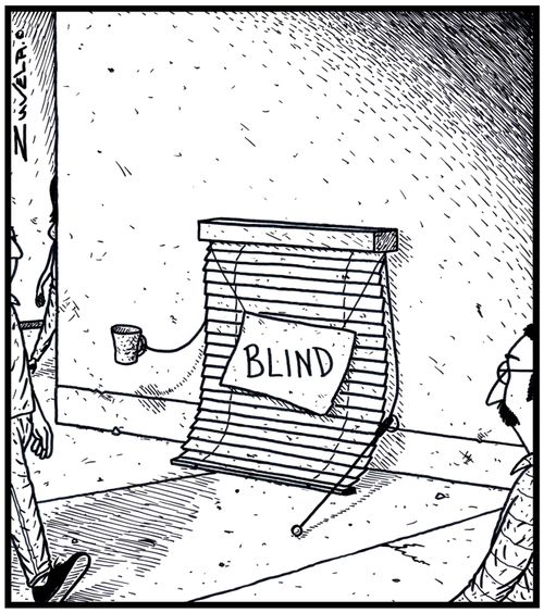 A Blind window blind on the streets hoping for a donation.
