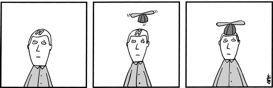 Helicopter hat lands on helipad on top of man's head.